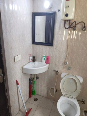 Bathroom in 3 BHK Apartment at Mahagun Moderne, Sector 78 – for Rent