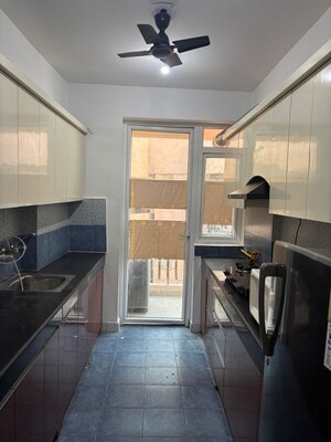 Kitchen in 2 BHK Apartment at Nimbus The Hyde park, Sector 78 – for Rent