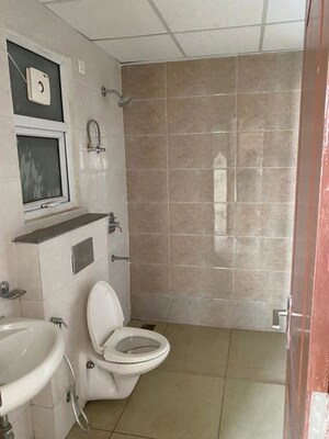 Bathroom in 3 BHK Apartment at Ansal Crown Heights, Sector 80 – for Rent