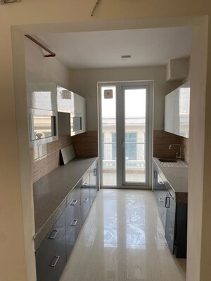 Kitchen in 3 BHK Apartment at Ansal Crown Heights, Sector 80 – for Rent
