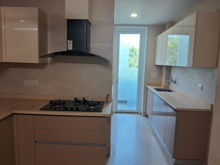 Kitchen, defence colony 4 Bedroom 400 Sq.Yd. Builder Floor In Defence Colony Delhi 10137287