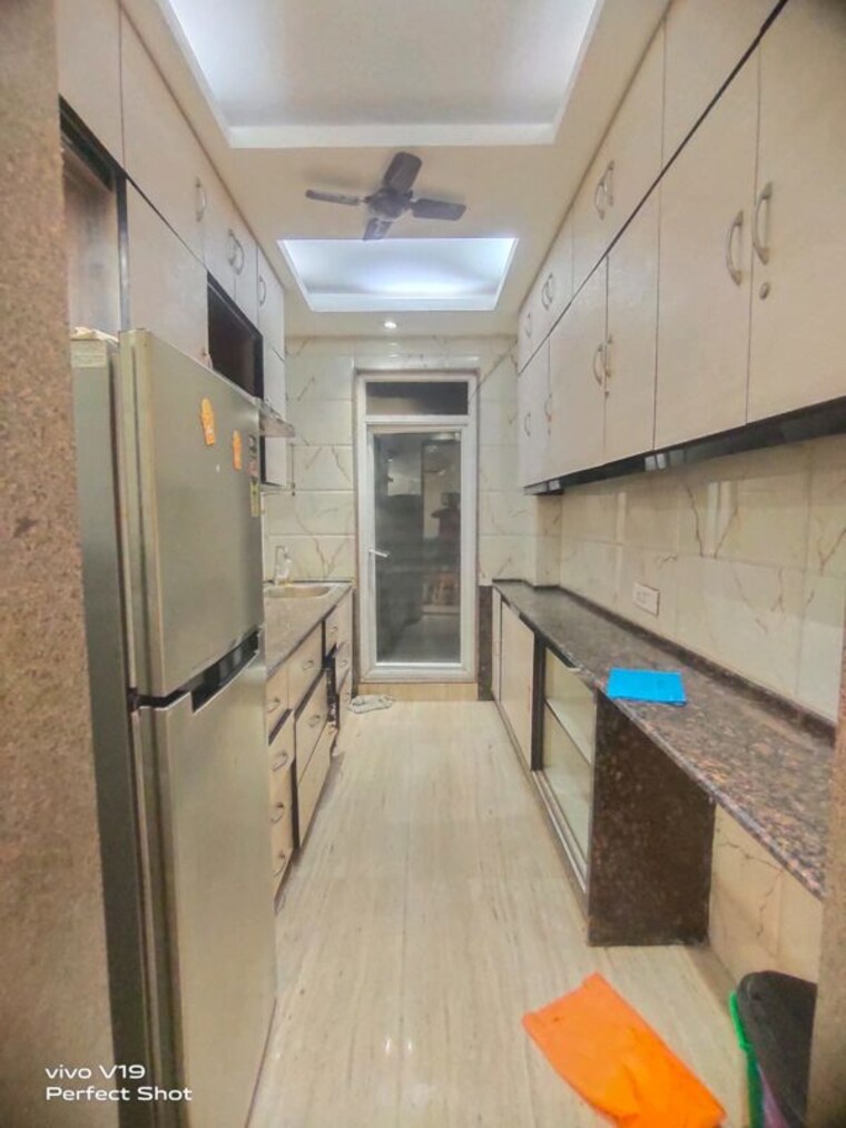 Kitchen, east of kailash 3 Bedroom 125 Sq.Yd. Builder Floor In East Of Kailash Delhi 10137290