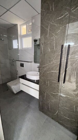 Bathroom in 3 BHK Apartment at Affinity Greens, International Airport Road – for Rent