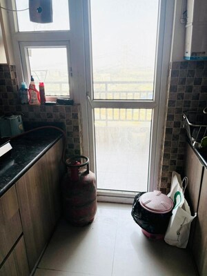 Kitchen in 3.5 BHK Apartment at Adani M2K Oyster Grande, Sector 102 – for Sale