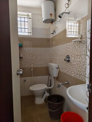 Bathroom in 2 BHK Apartment at Halasuru – for Rent