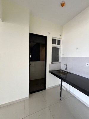 Kitchen in 2 BHK Apartment at Kolte Patil R10, Hinjewadi – for Rent