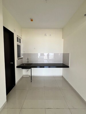 Kitchen in 2 BHK Apartment at Kolte Patil R10, Hinjewadi – for Rent