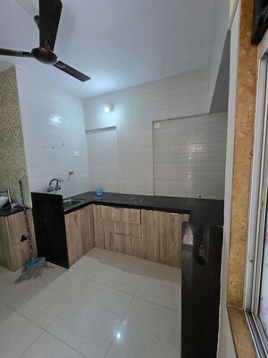 Kitchen in 3 BHK Apartment at Wadgaon Sheri – for Rent