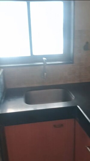 Kitchen in 1 BHK Apartment at Ashford Hema Park, Bhandup East – for Rent