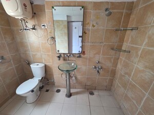Bathroom in 3 BHK Apartment at Orchid Petals, Sector 49 – for Rent