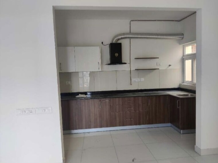 Kitchen, brigade-bricklane 2 Bedroom 635 Sq.Ft. Apartment In Jakkuru Bangalore 10137495