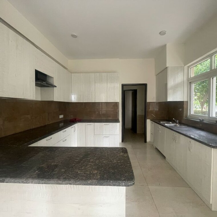 Kitchen, bptp-amstoria 4 Bedroom 3560 Sq.Ft. Villa In Sector 102 Gurgaon 10137504