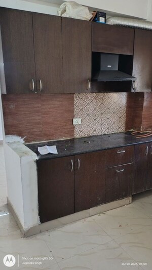 Kitchen in 3.5 BHK Apartment at Aims Golf City, Sector 75 – for Sale
