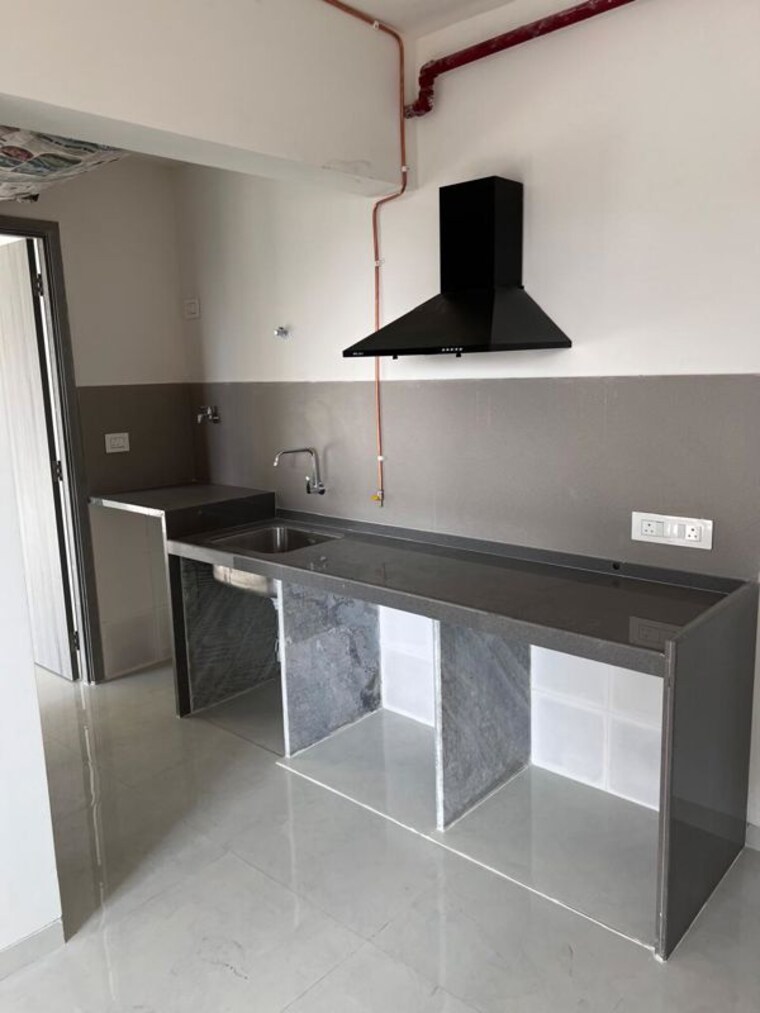 Kitchen, mangal-karini 2 Bedroom 700 Sq.Ft. Apartment In Goregaon West Mumbai 10137541