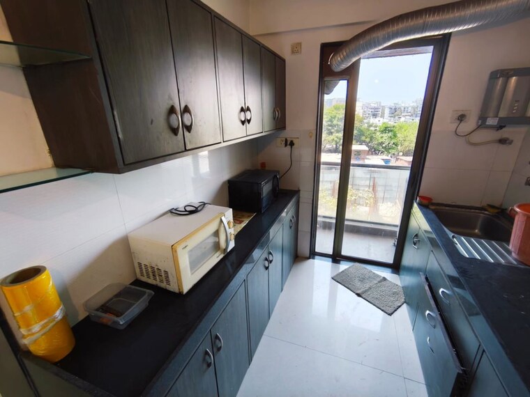 Kitchen, runwal-symphony 2 Bedroom 680 Sq.Ft. Apartment In Santacruz East Mumbai 10137562