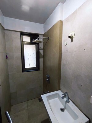 Bathroom in 2 BHK Apartment at Runwal Symphony, Santacruz East – for Rent