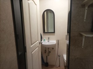 Bathroom in 1 BHK Apartment at Brahamand Phase 6 Chs Ltd, Brahmand – for Sale
