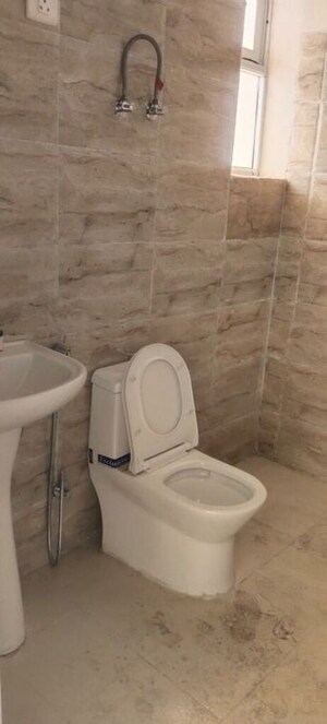 Bathroom in 3 BHK Apartment at Ajnara Homes, Sector 16b Greater Noida – for Rent