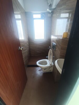 Bathroom in 2 BHK Apartment at Royal Oasis, Malad West – for Rent