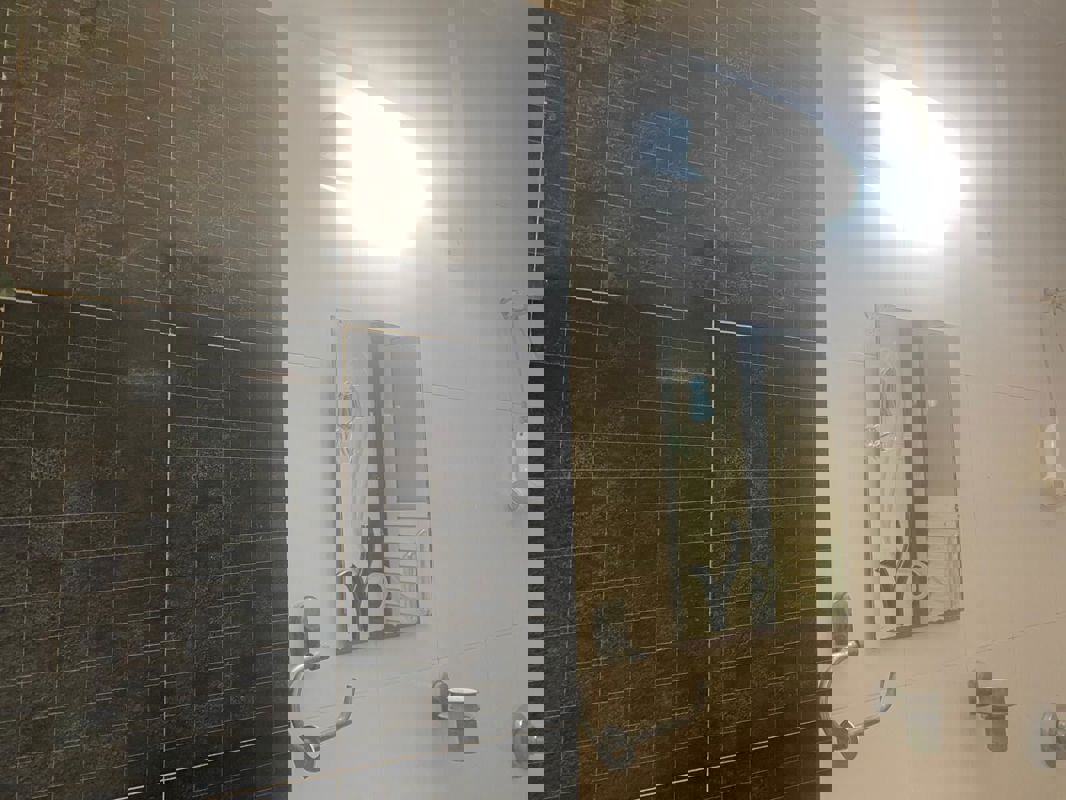 Bathroom in 3 BHK Apartment at Geetanjali CHSL, Bandra East – for Rent