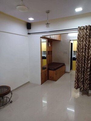 Living Room in 1 RK Apartment at Navbharat Sahyog CHS, Goregaon East – for Rent
