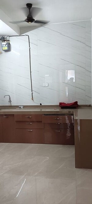 Kitchen in 3 BHK Apartment at Metro Millennium, Malad West – for Rent