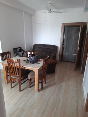 Living Room in 2 BHK Apartment at Galaxy Royale, Gaur City 2 – for Sale