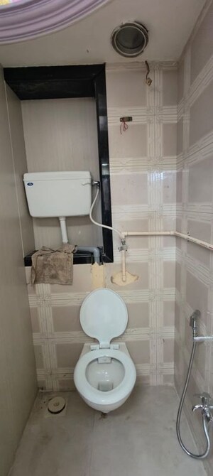 Bathroom in 1 BHK Apartment at Akshardham CHS, Malad West – for Rent