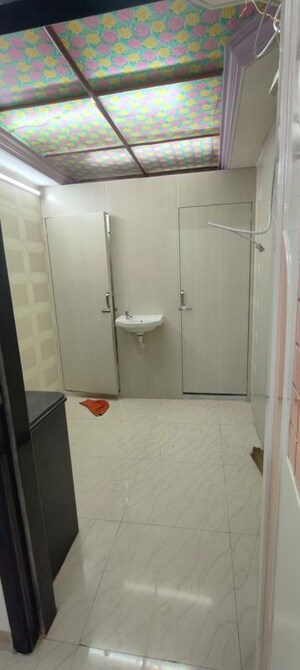 Bathroom in 1 BHK Apartment at Akshardham CHS, Malad West – for Rent