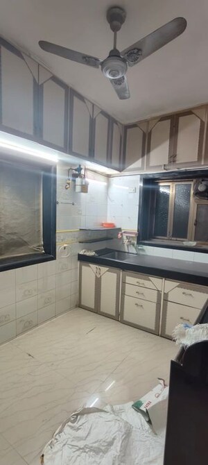 Kitchen in 1 BHK Apartment at Akshardham CHS, Malad West – for Rent