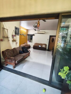 Living Room in 2 BHK Apartment at Vijay Enclave, Waghbil – for Rent