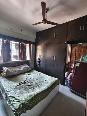 Bedroom in 2 BHK Apartment at Vijay Enclave, Waghbil – for Rent