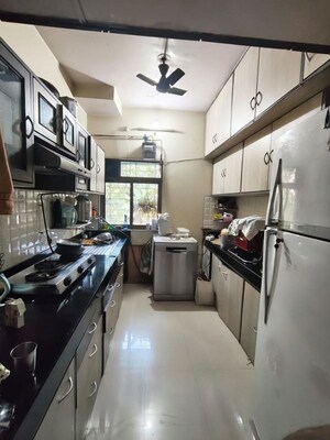 Kitchen in 2 BHK Apartment at Vijay Enclave, Waghbil – for Rent