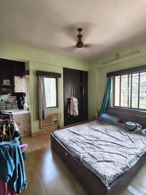 Bedroom in 2 BHK Apartment at Vijay Enclave, Waghbil – for Rent