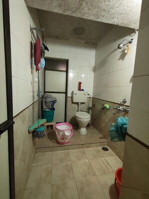 Bathroom in 2 BHK Apartment at Vijay Enclave, Waghbil – for Rent