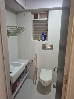 Bathroom in 2 BHK Apartment at Group Seven Rushi Heights, Goregaon East – for Rent