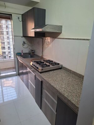 Kitchen in 2 BHK Apartment at Group Seven Rushi Heights, Goregaon East – for Rent
