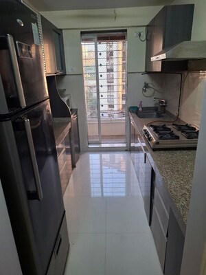 Kitchen in 2 BHK Apartment at Group Seven Rushi Heights, Goregaon East – for Rent