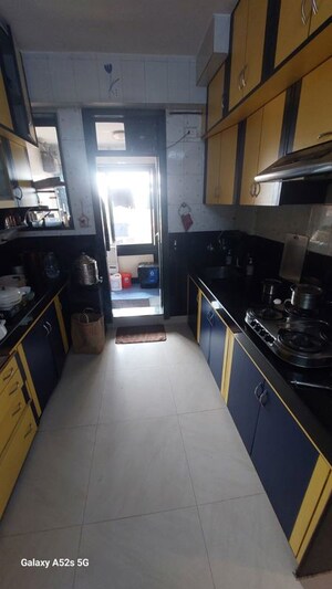 Kitchen in 2 BHK Apartment at Raj Rudram Apartments, Goregaon East – for Rent