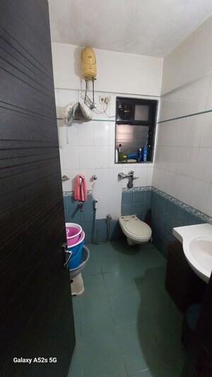 Master Bedroom in 2 BHK Apartment at Raj Rudram Apartments, Goregaon East – for Rent