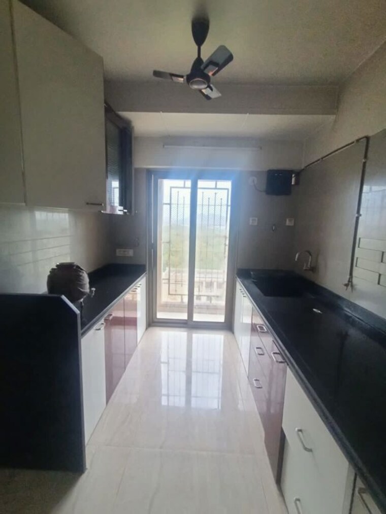 Kitchen, madhav-palacia 3 Bedroom 850 Sq.Ft. Apartment In Ghodbunder Road Thane 10137679