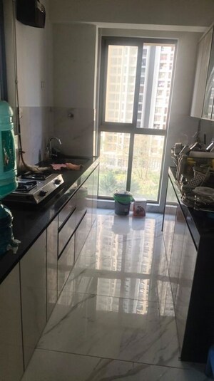 Kitchen in 2 BHK Apartment at Raymond Ten X Habitat, Pokhran Road No Two – for Rent