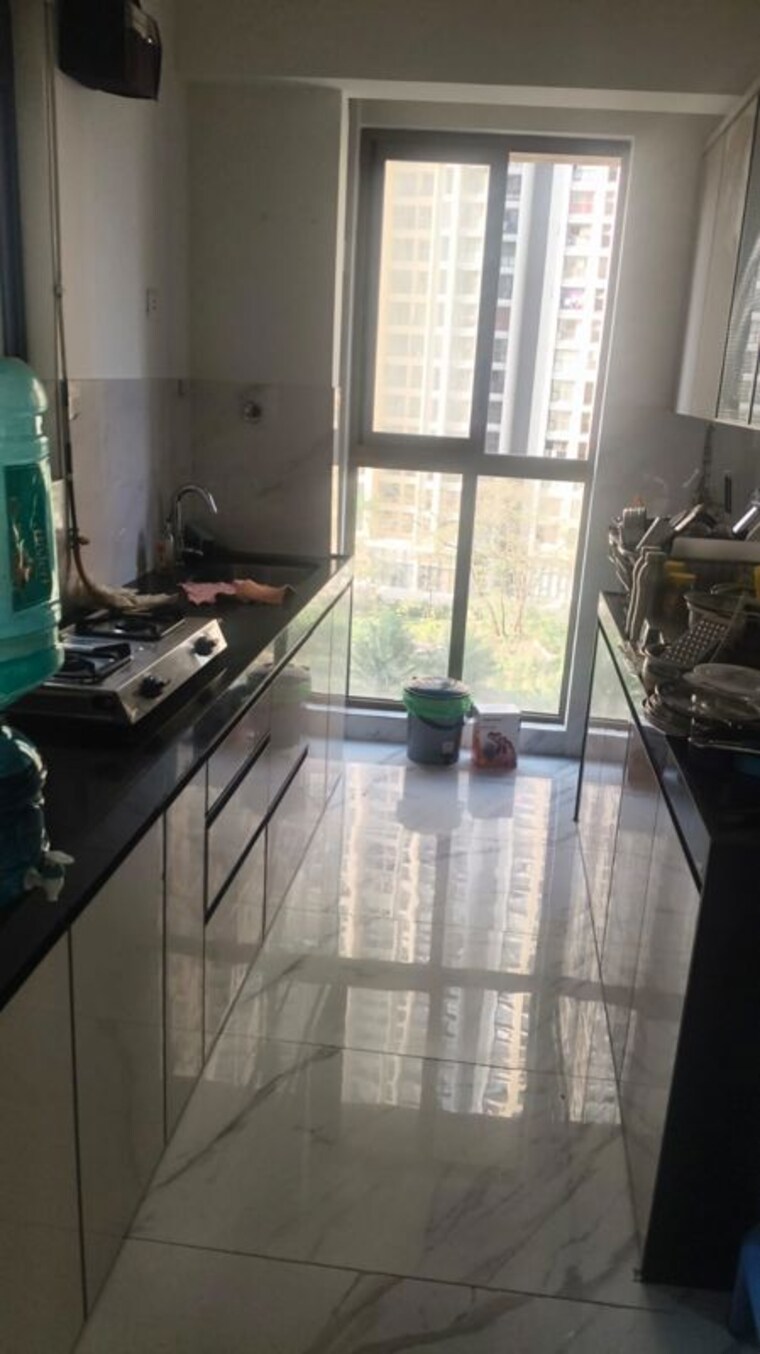 Kitchen, raymond-ten-x-habitat 2 Bedroom 565 Sq.Ft. Apartment In Pokhran Road No Two Thane 10137693