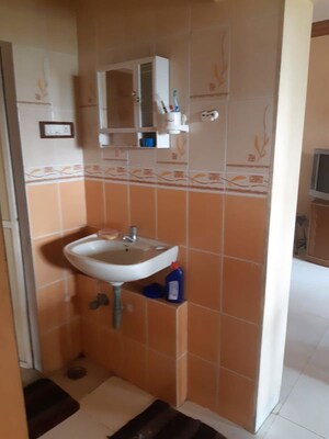 Bathroom in 1 BHK Apartment at Eden Woods complex, Manpada – for Rent