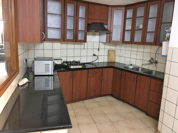 Kitchen, unitech-uniworld-gardens 3.5 Bedroom 2027 Sq.Ft. Apartment In Sector 47 Gurgaon 10137786
