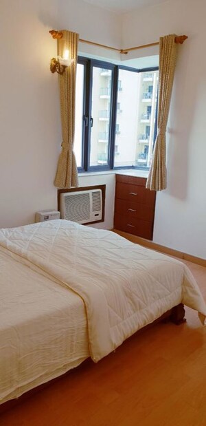 Bedroom in 3.5 BHK Apartment at Unitech Uniworld Gardens, Sector 47 – for Rent
