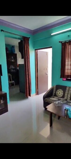 Living Room in 2 BHK Apartment at Shri Nirmaladevi Heights, Rahatani – for Rent
