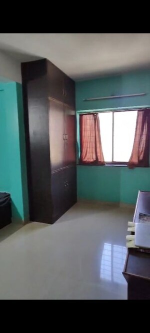 Living Room in 2 BHK Apartment at Shri Nirmaladevi Heights, Rahatani – for Rent