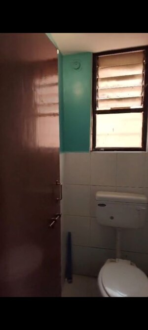 Bathroom in 2 BHK Apartment at Shri Nirmaladevi Heights, Rahatani – for Rent