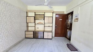 Living Room in 1 BHK Apartment at Atlanta CHS, Malad West – for Rent